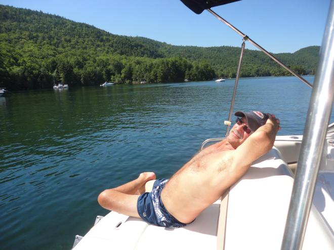 my hubby relaxing on Red Rock Bay