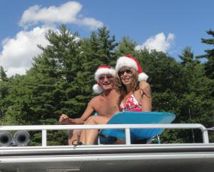me & my hubby hanging out on top of our friend's boat