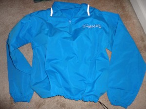 This year's windbreaker.  I also have yellow & orange.  I'd wear it if it were a holiday color.