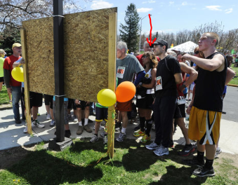 checking out the results board (photo by David Lee/Hudson-Catskill Newspapers )